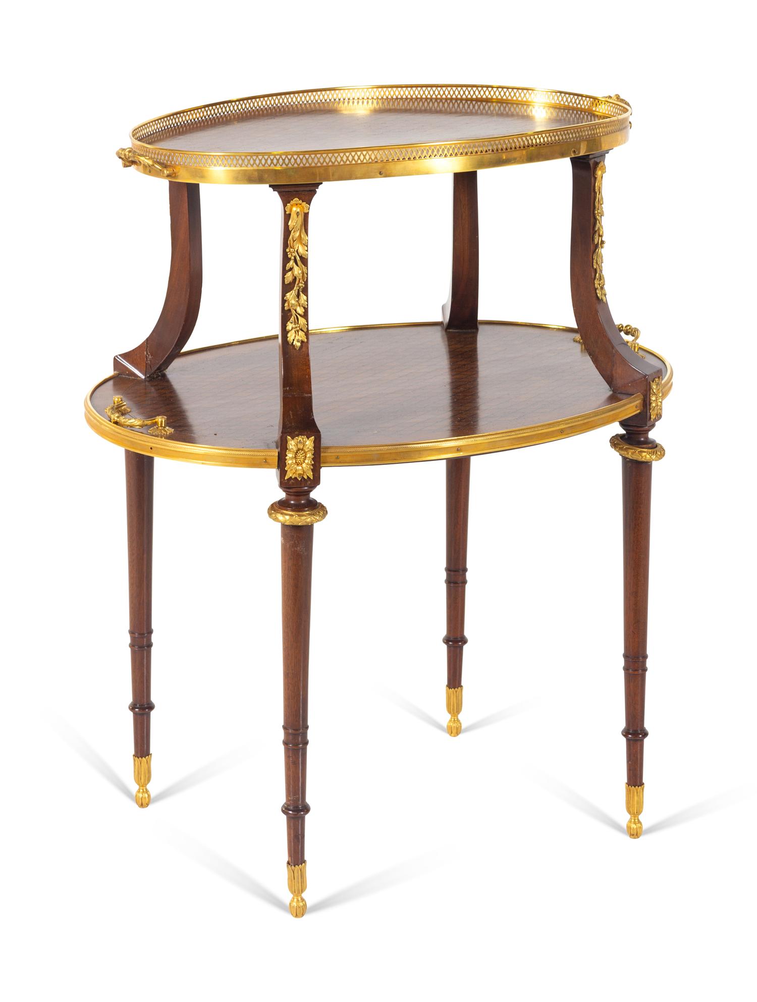 A Louis XVI Style Gilt Bronze Mounted Parquetry Two-Tier Table