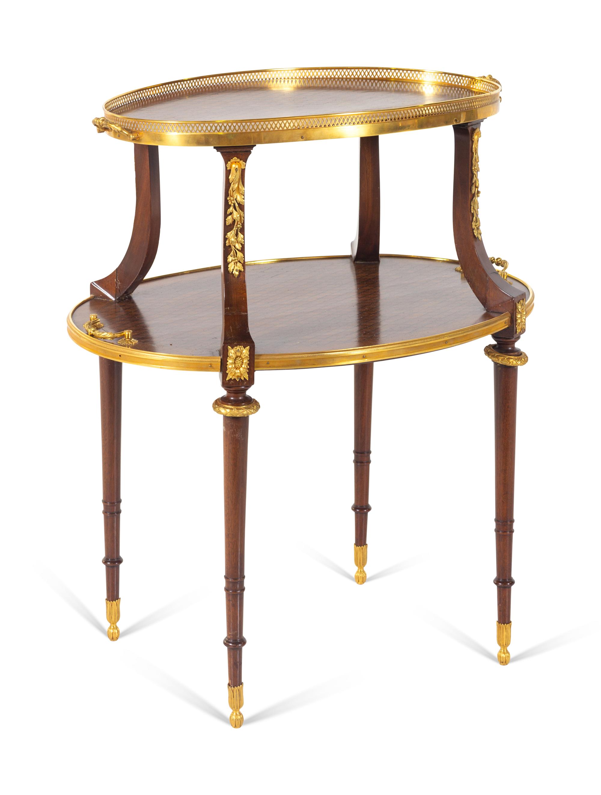 A Louis XVI Style Gilt Bronze Mounted Parquetry Two-Tier Table