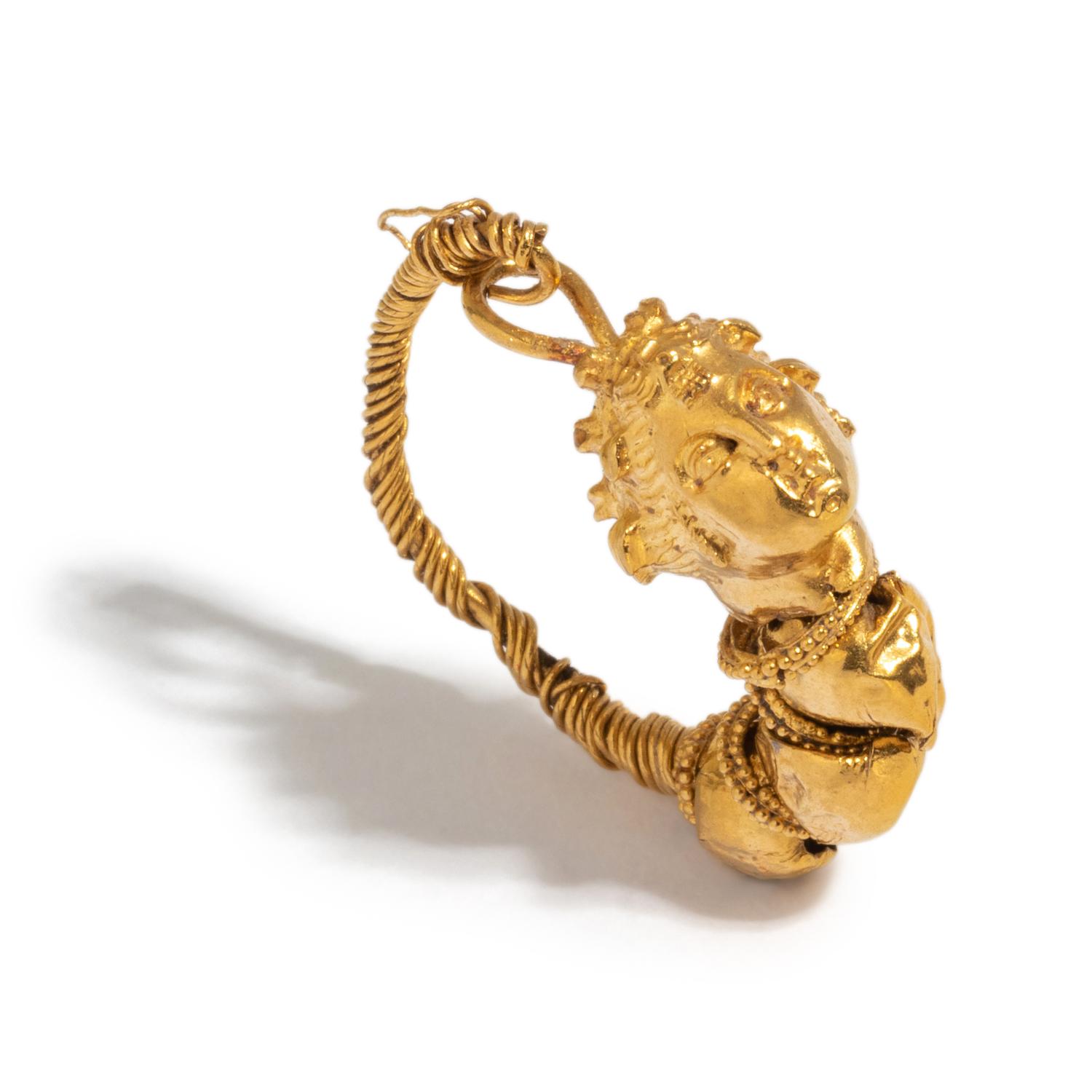 A Greek Gold Earring with the Head of a Maenad