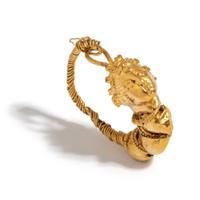 A Greek Gold Earring with the Head of a Maenad