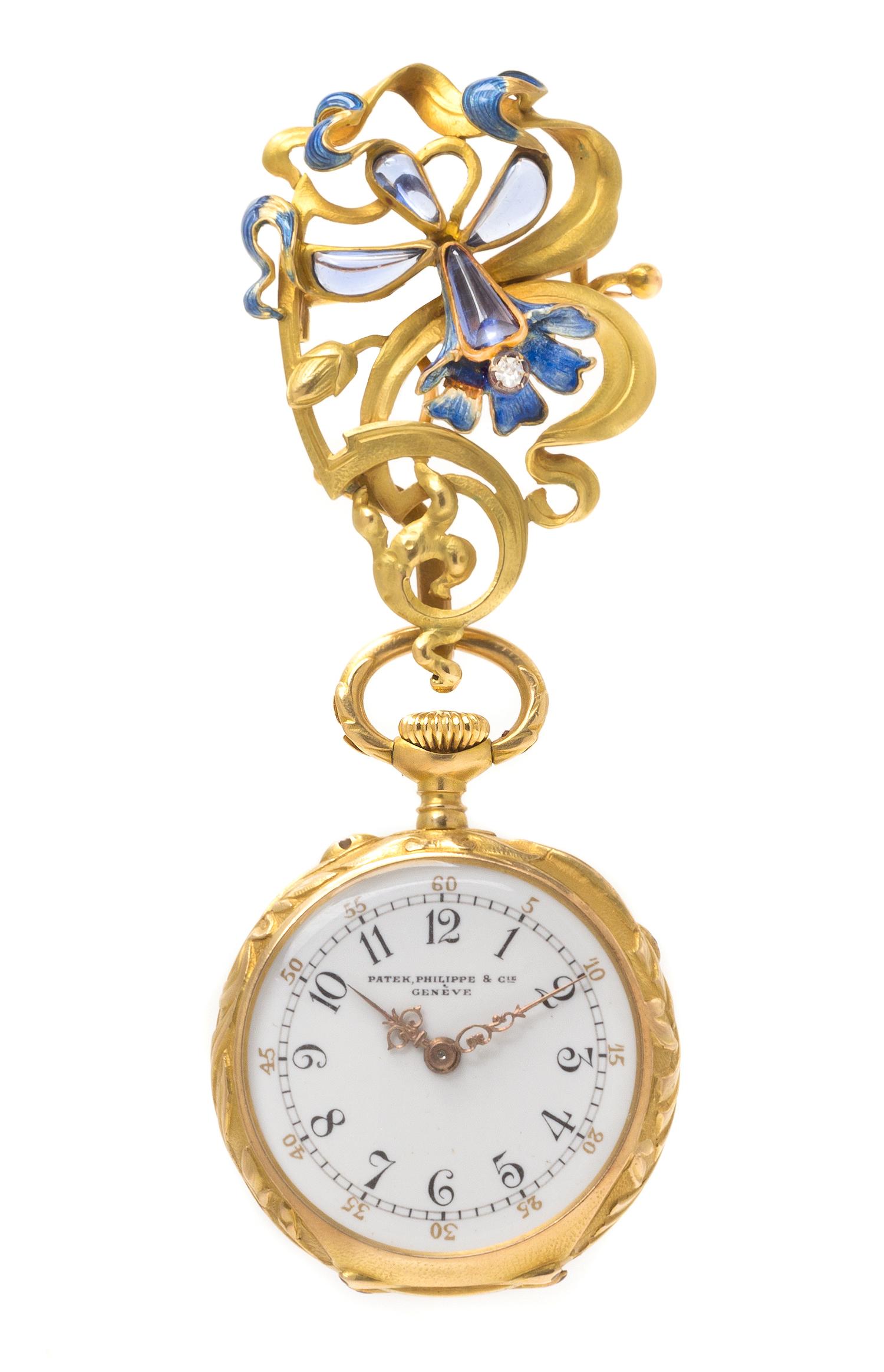 An Art Nouveau Gold, Iolite, Diamond and Polychrome Enamel Lapel Watch, Patek Philippe, 17.70 dwts.