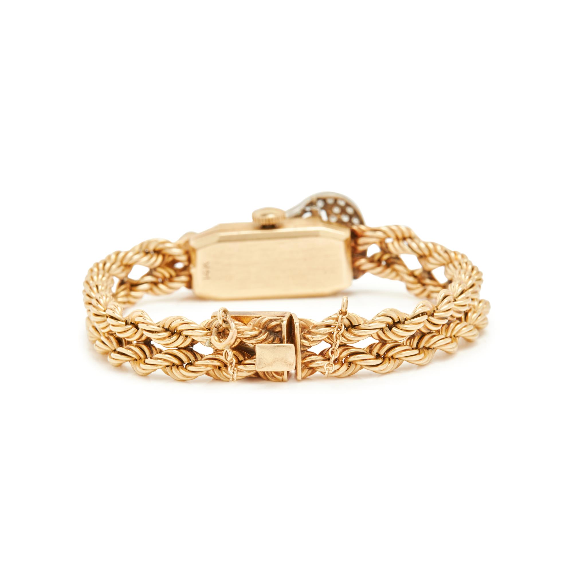 RETRO, 14K YELLOW GOLD AND DIAMOND MYSTERY DIAL WATCH