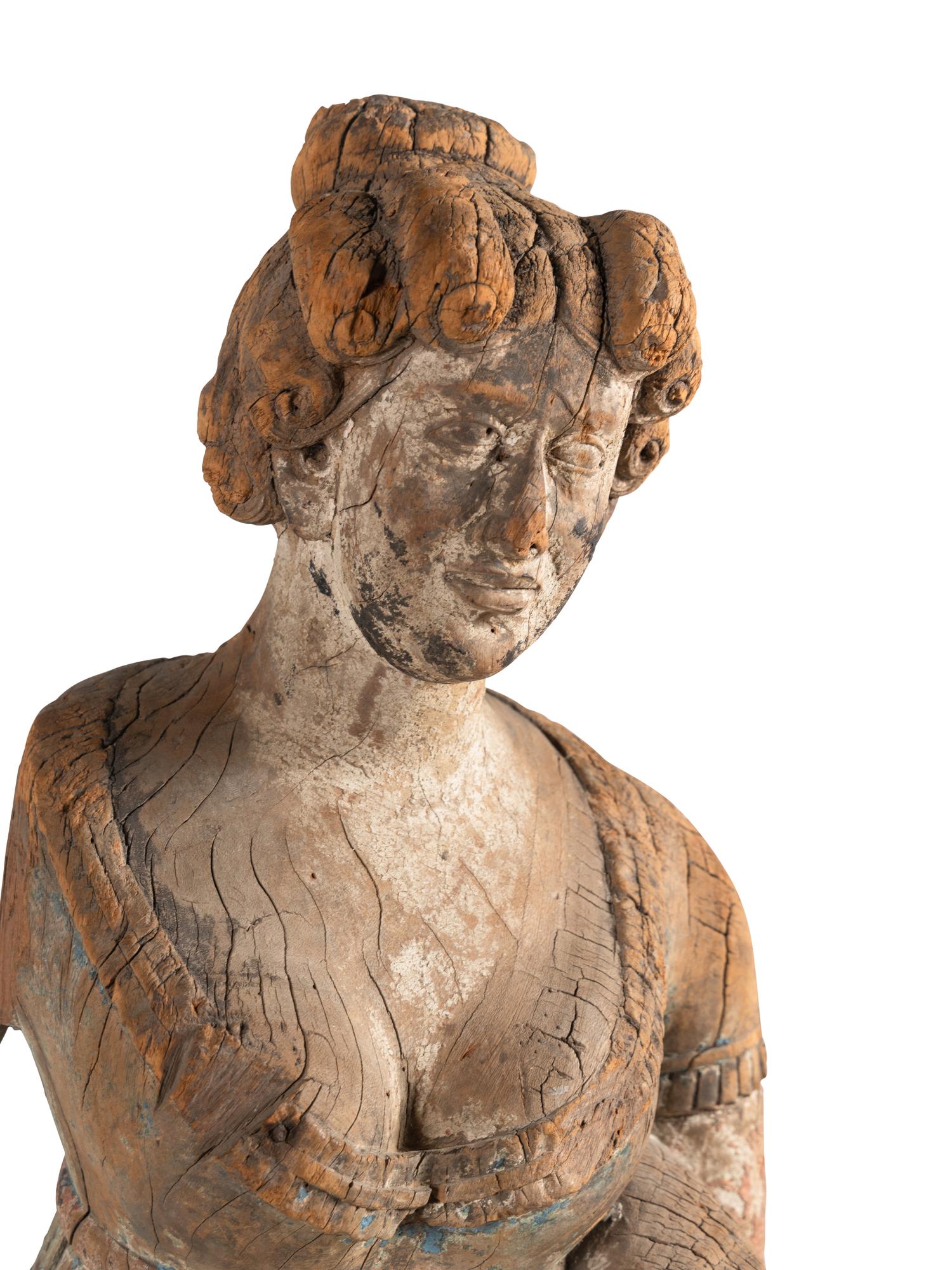 A Carved Wood Maiden Form Masthead