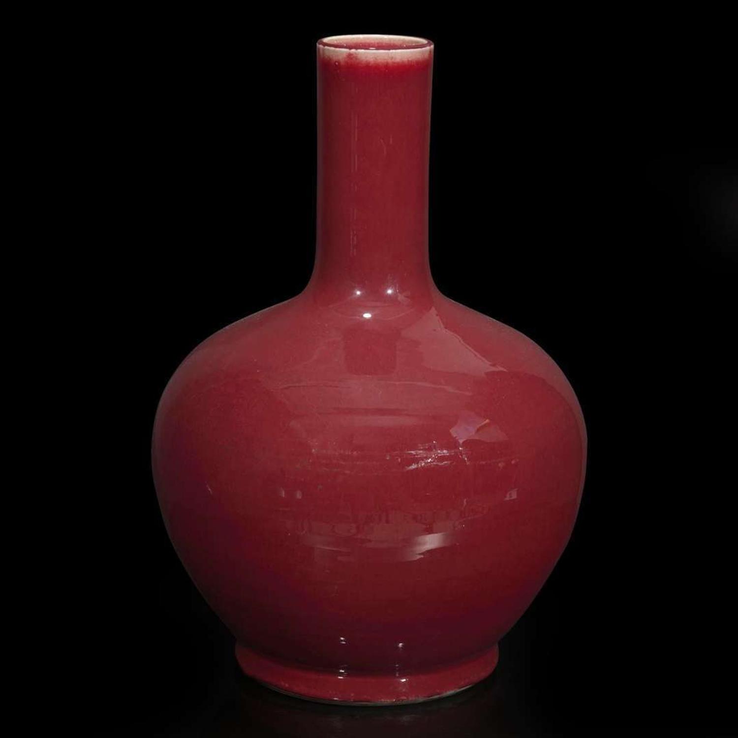 A large Chinese copper red-glazed porcelain vase, Tianqiuping 釉里红天球瓶