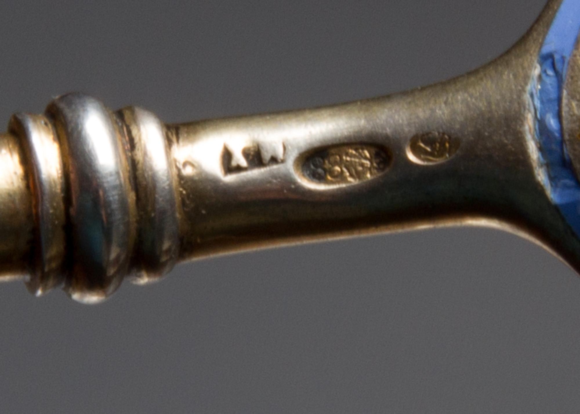 A Russian Silver-Gilt and Enamel Spoon, Maker's mark Cyrillic MCh, Moscow, early 20th century, having an enamel and twist decorated han