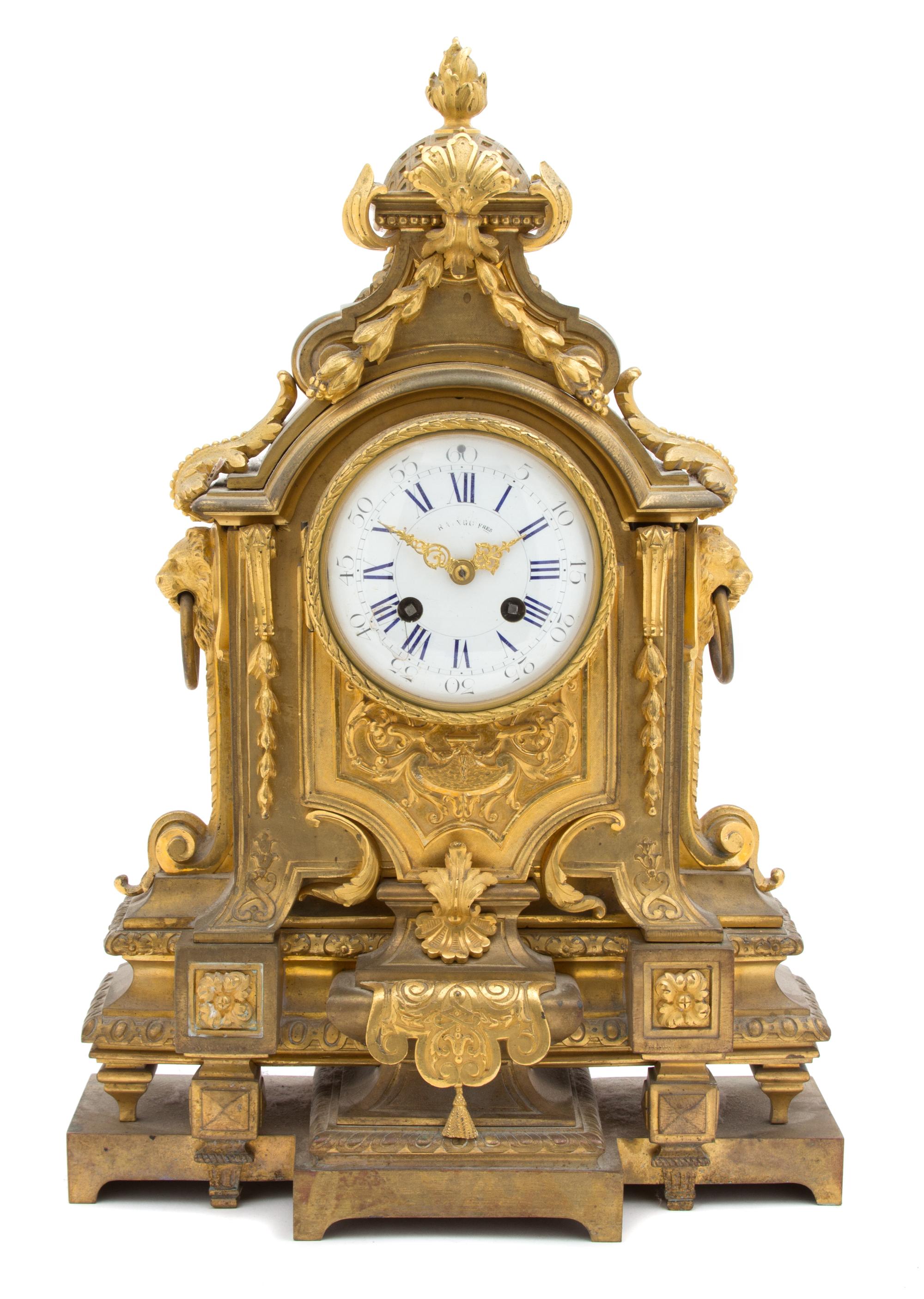 A Louis XVI Style Gilt Metal Mantel Clock Height 15 inches. — 19TH CENTURY