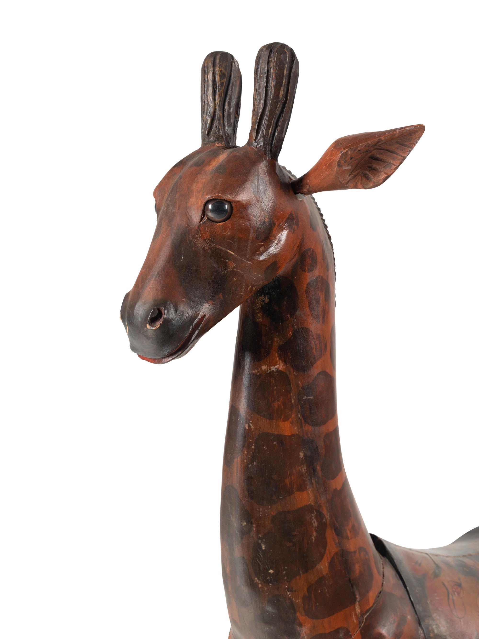 A Carved and Painted Carousel-Style Giraffe Figure