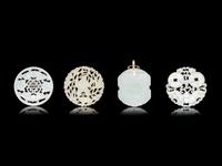 Four Chinese Jade and Serpentine Pendants