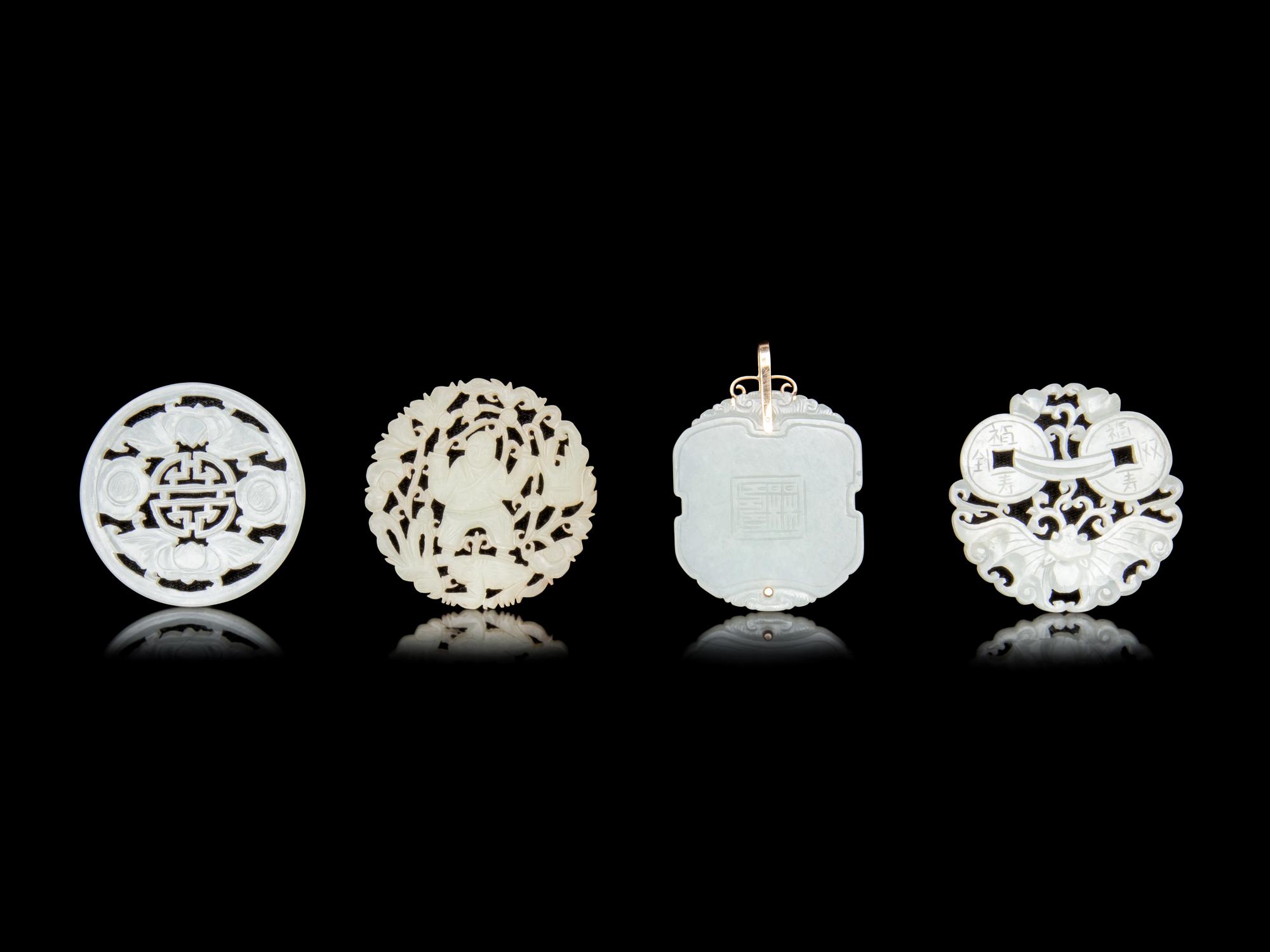 Four Chinese Jade and Serpentine Pendants