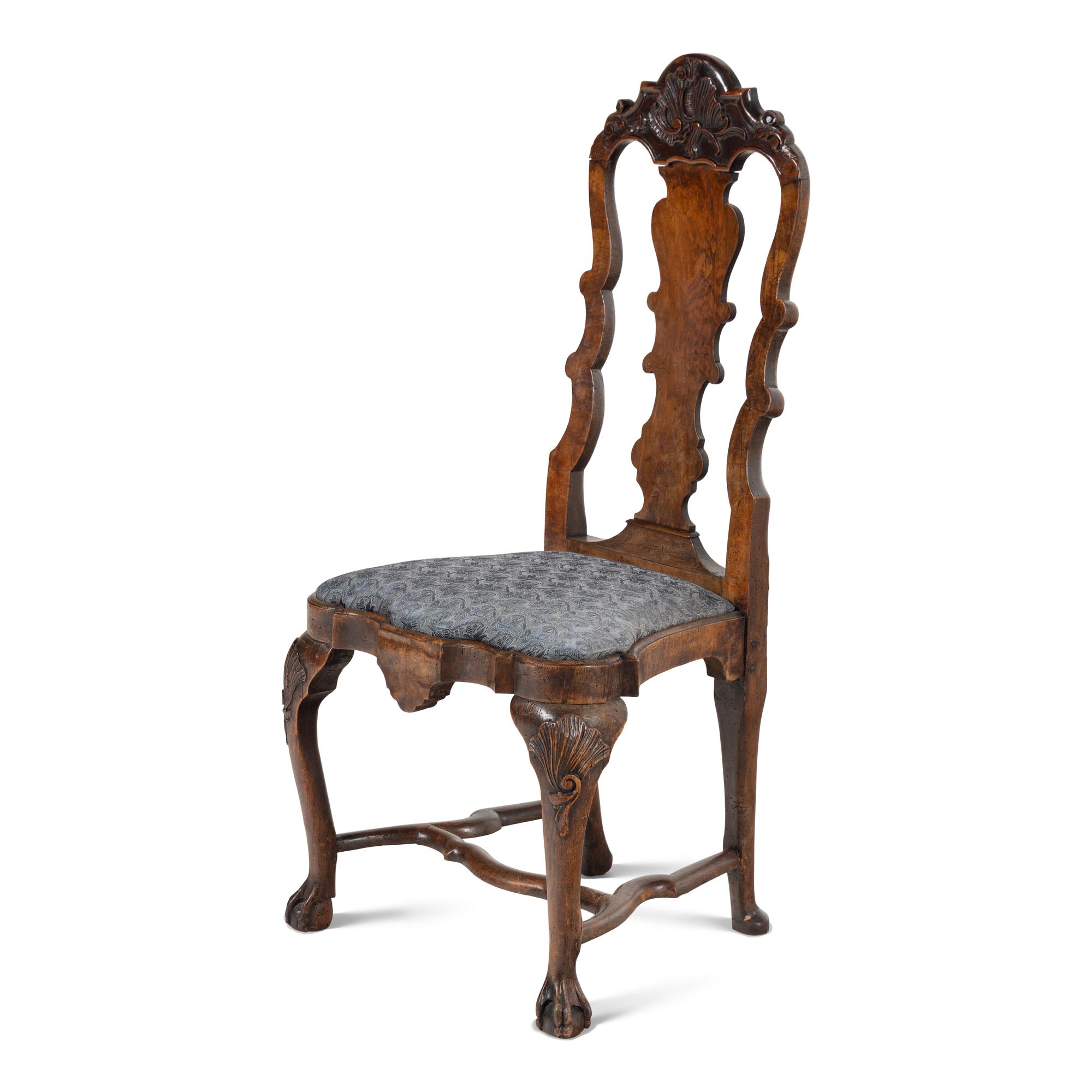 A Set of Three Dutch Carved Walnut Side Chairs