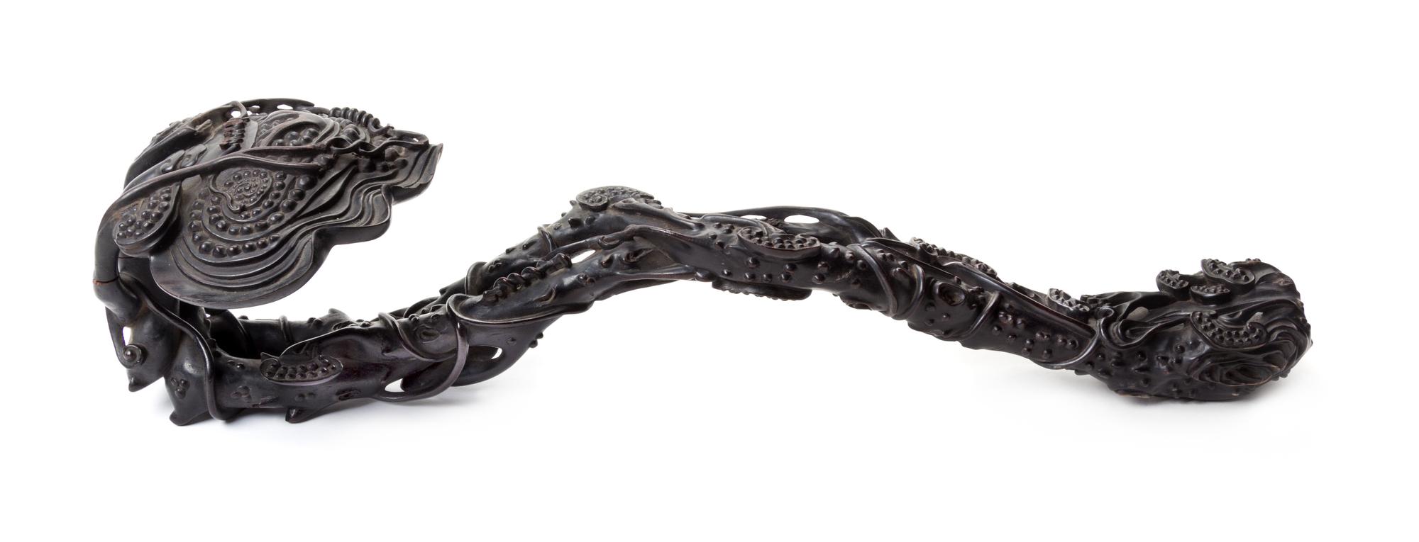 A Large Carved Zitan Wood Ruyi Scepter Length 21 inches. — 20TH CENTURY