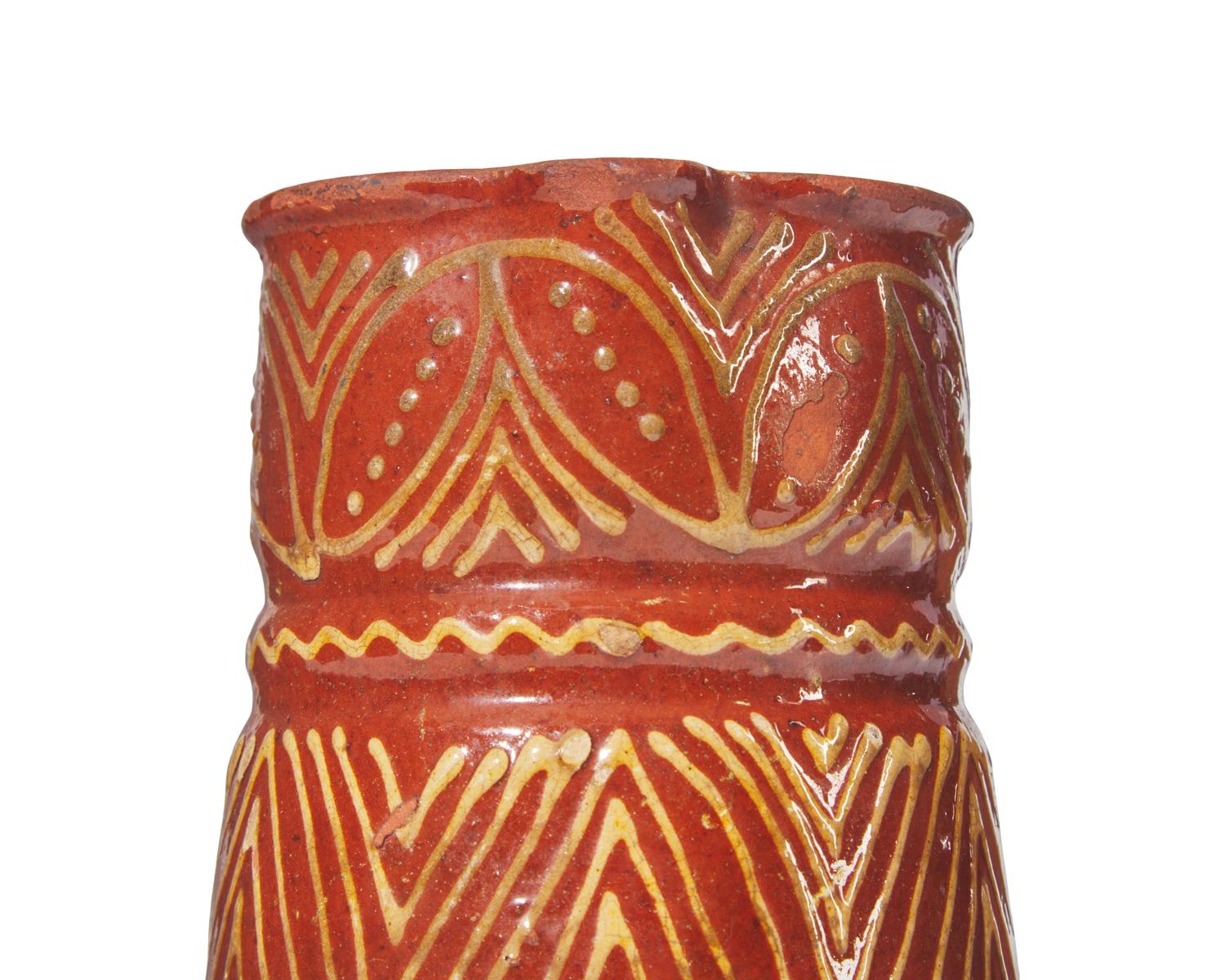 An Assorted Group of Six Glazed Redware Tablewares