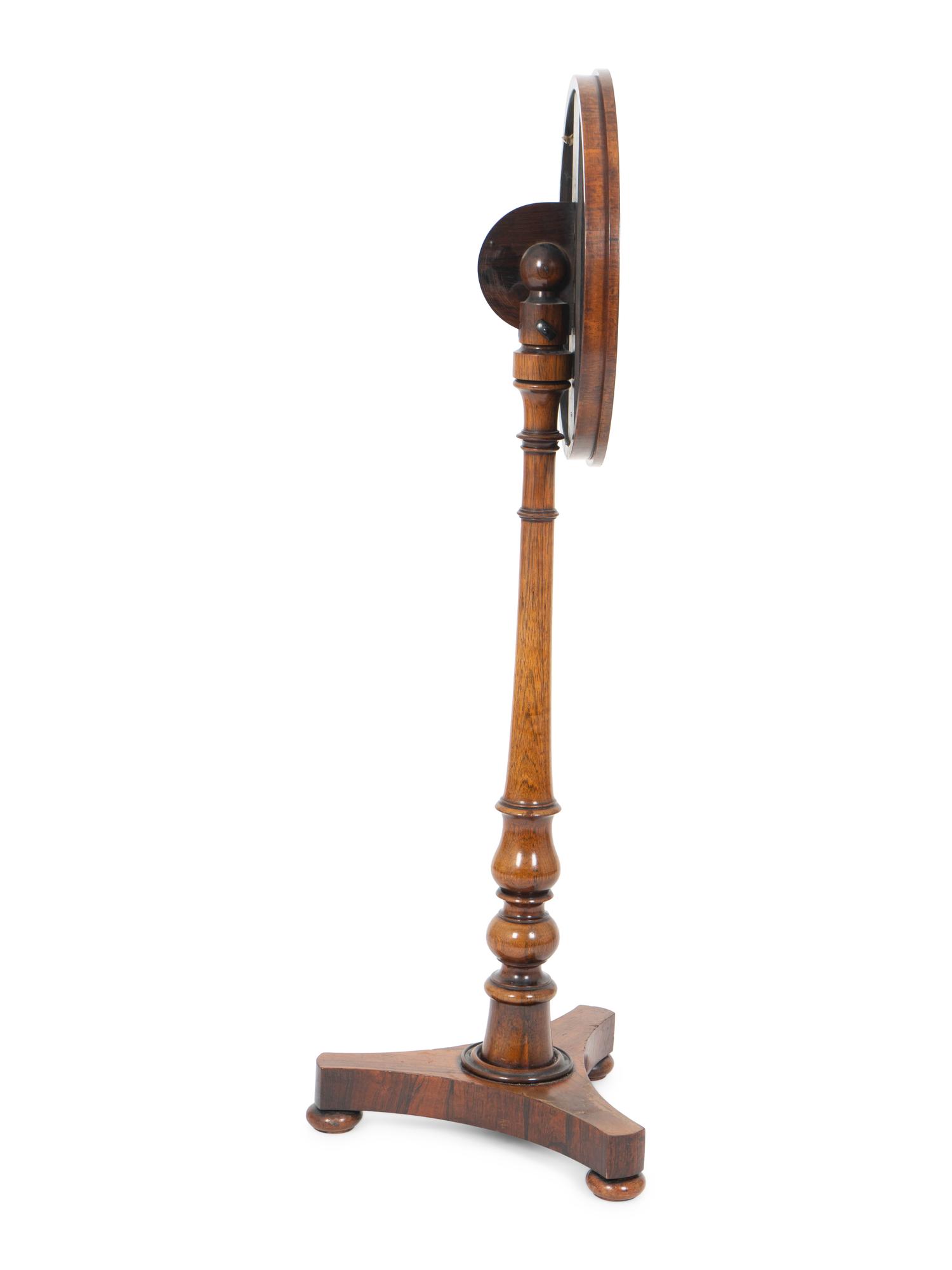 A Regency Rosewood Tilt Top Reading Stand — 19TH CENTURY