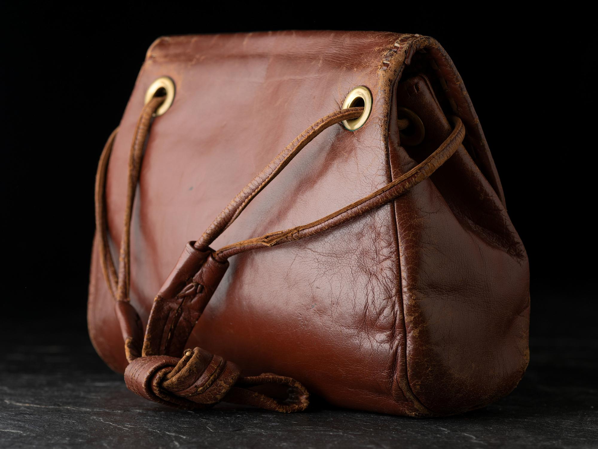 Brown Leather Drawstring Purse, with Brass Thunderbird