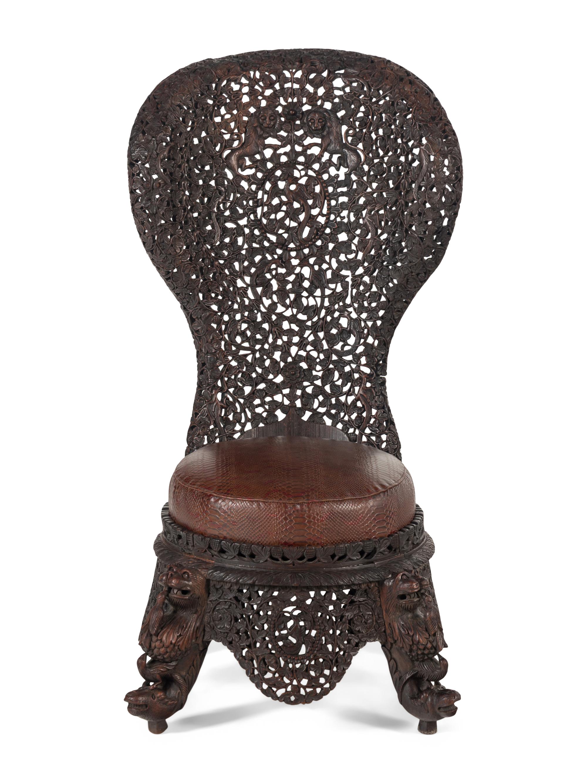 An Anglo-Indian Carved Hardwood Slipper Chair