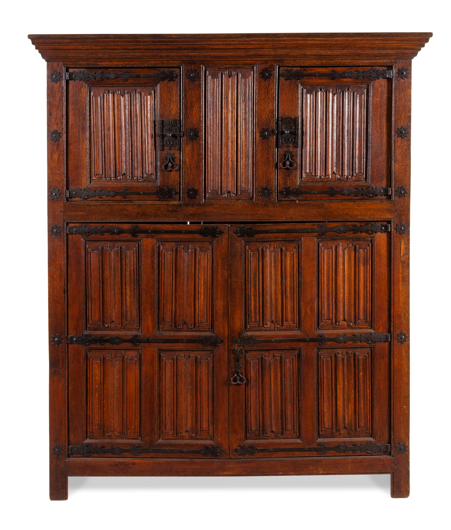 A Dutch Linen-Fold Carved Oak Cabinet Height 75 7/8 x width 59 x depth 22 inches. — 17TH CENTURY AND LATER