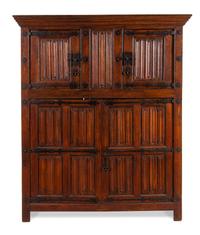 A Dutch Linen-Fold Carved Oak Cabinet Height 75 7/8 x width 59 x depth 22 inches. — 17TH CENTURY AND LATER
