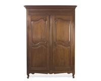 A Louis XVI carved oak armoire, circa 1790-1800
