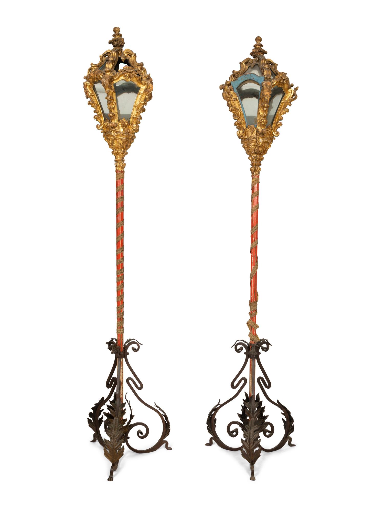 A Pair of Venetian Giltwood and Red-Painted Gondola Lanterns