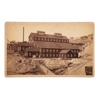 [MINING - NEVADA]. A group of 3 early mining images and a photograph booklet of mining activity in Virginia City, Goldfield, and Rawhide, Nevada, comprising: