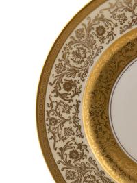 A Set of Twelve Bavarian Gilt Decorated Porcelain Plates