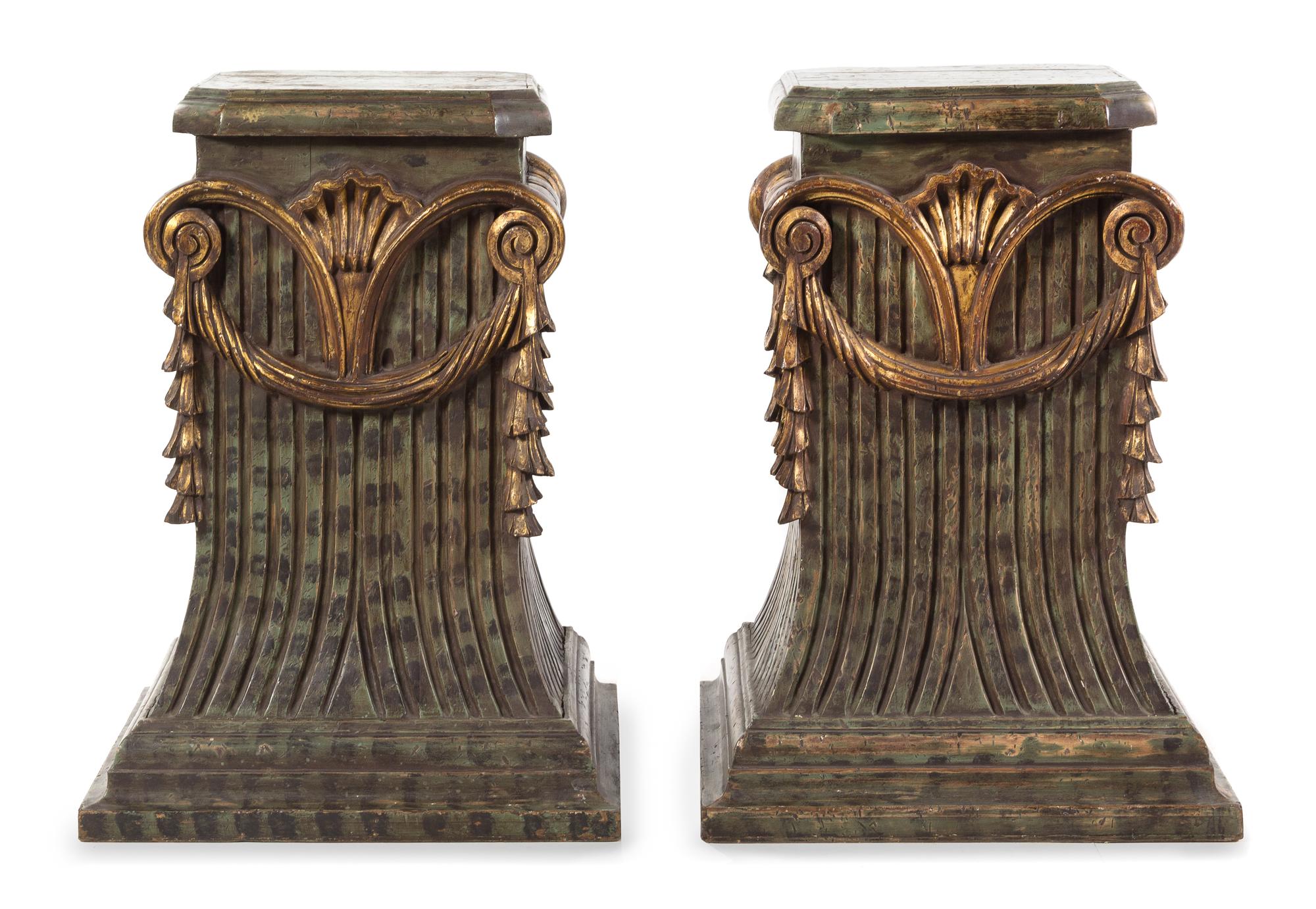 A Pair of Painted and Parcel Gilt Pedestals Height 31 x width 22 1/4 x depth 22 3/4 inches. — 20TH CENTURY