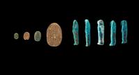 Five Egyptian Faience Ushabtis and Four Egyptian Faience and Stone Scarabs