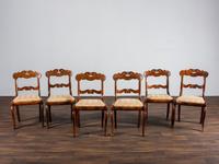 A Set of Six Classical Carved Walnut Dining Chairs