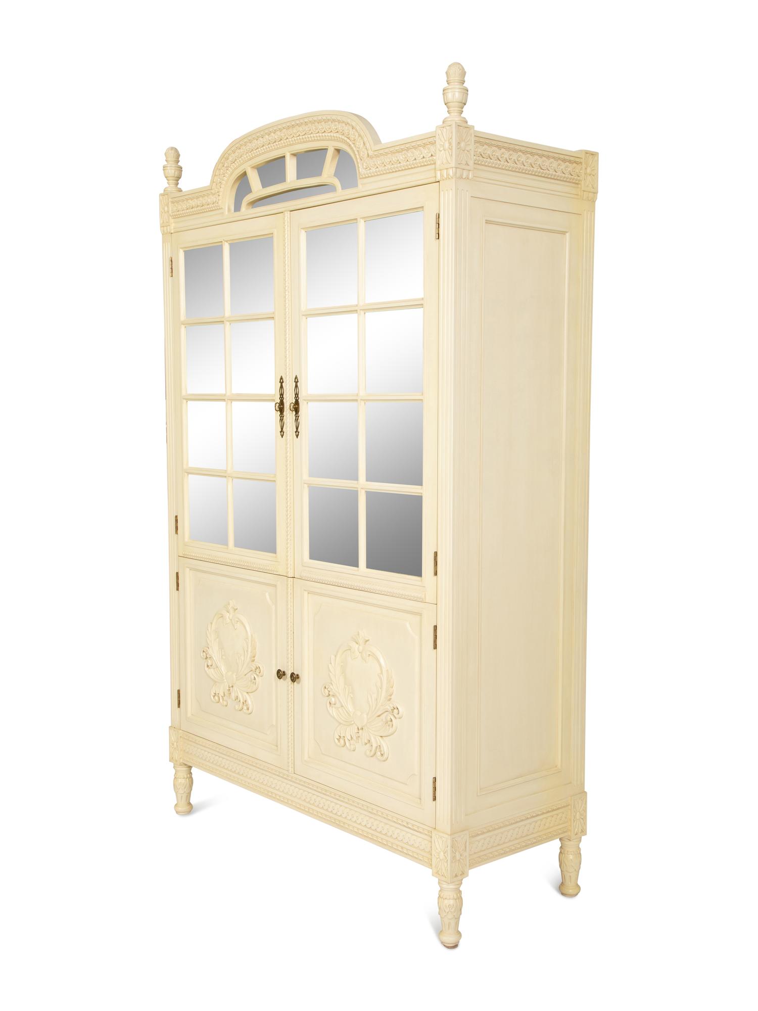 A Louis XVI Style White Painted Four-Door Armoire by Julia Gray, New York