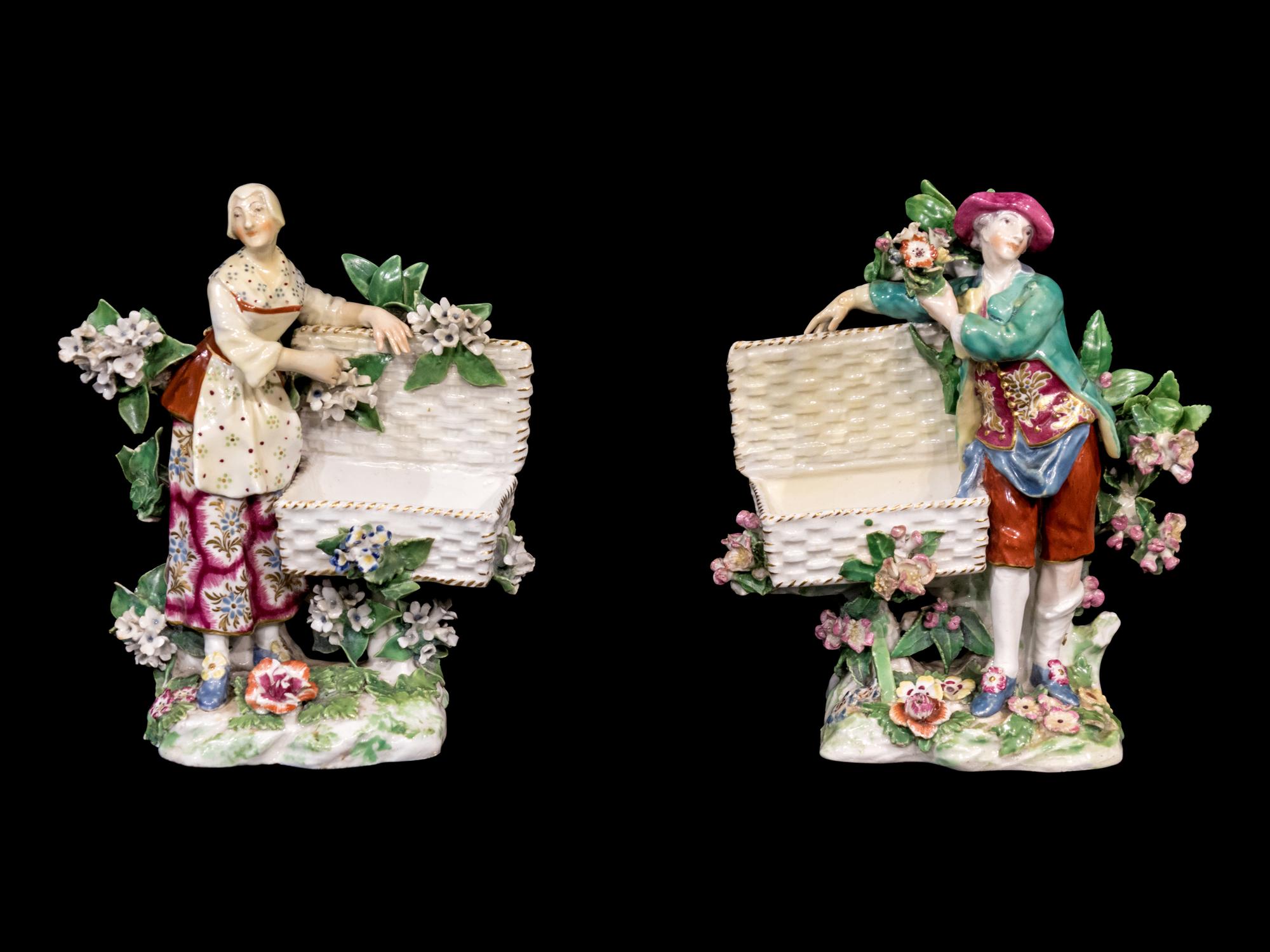 A Pair of Chelsea Porcelain Sweetmeat Figures