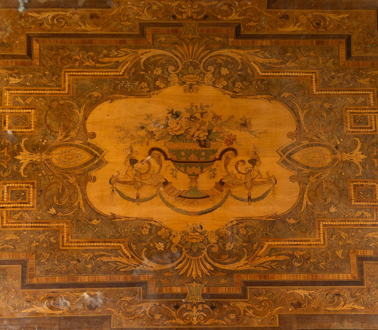 A Napoleon III Gilt Bronze Mounted Marquetry Center Table