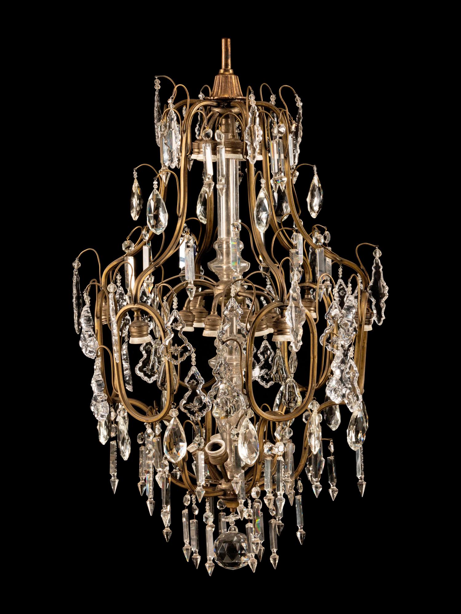 A Neoclassical Gilt Metal and Cut-Glass Cage Form Twelve-Light Chandelier