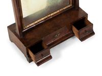 A George II Parcel Gilt Walnut Dressing Mirror