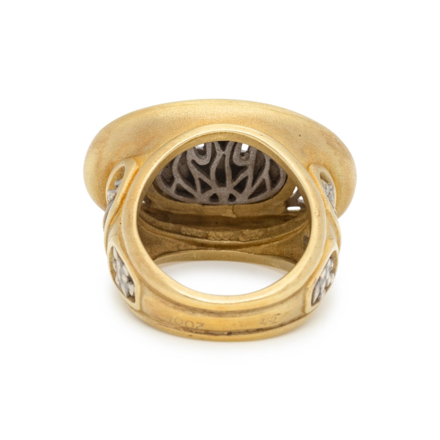 KIESELSTEIN-CORD, BICOLOR GOLD AND DIAMOND 'ANGEL IN THE WINDOW' RING