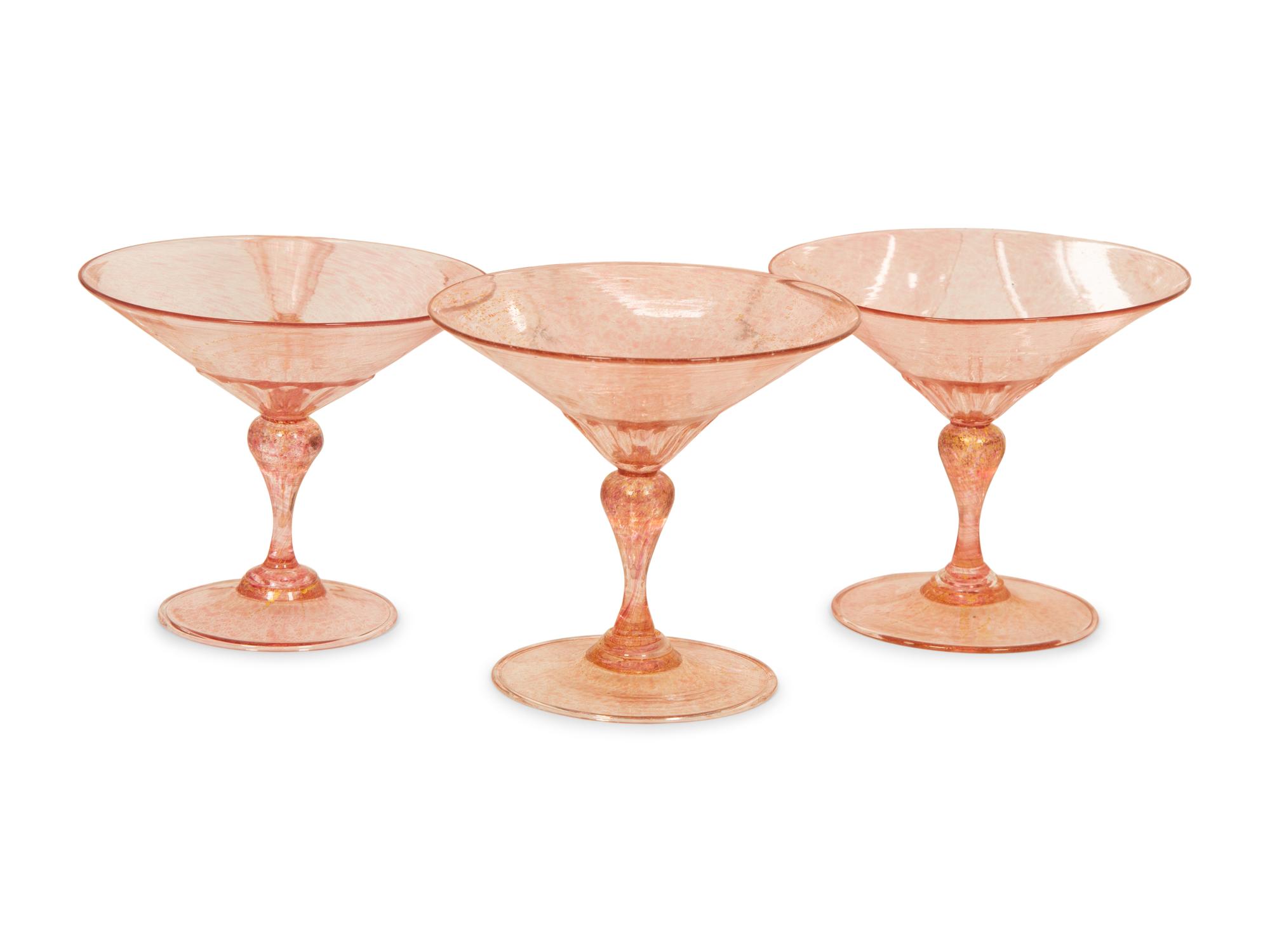 A Venetian Gilt Iridescent Glass Table Service