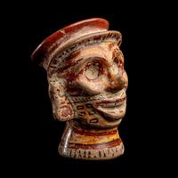 A Mixtec Polychrome Vessel in the form of a Head