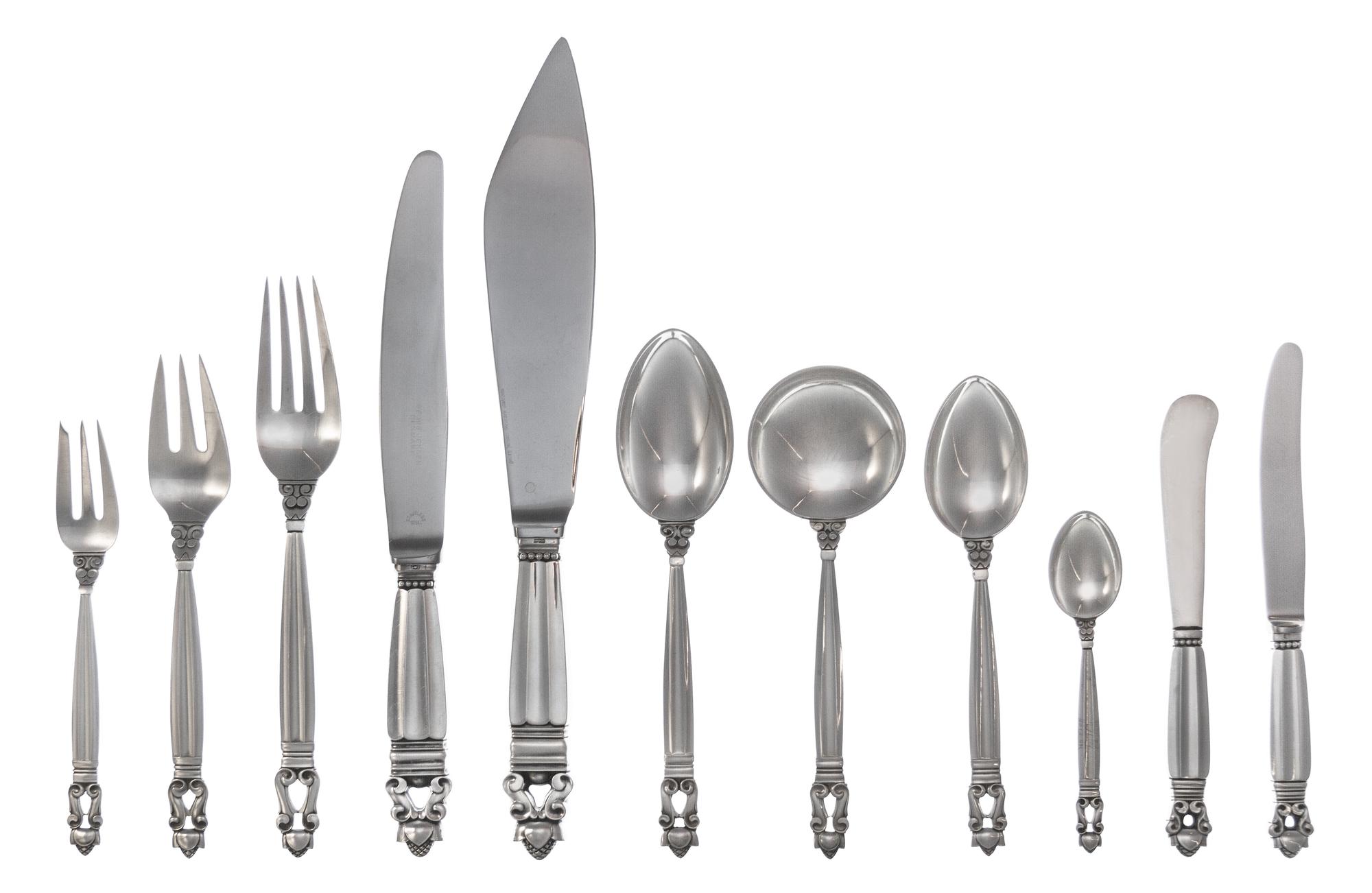 A Danish Silver Flatware Service, Georg Jensen Silversmithy, Copenhagen, Acorn pattern, comprising: 6 dinner knives 6 butter spreaders