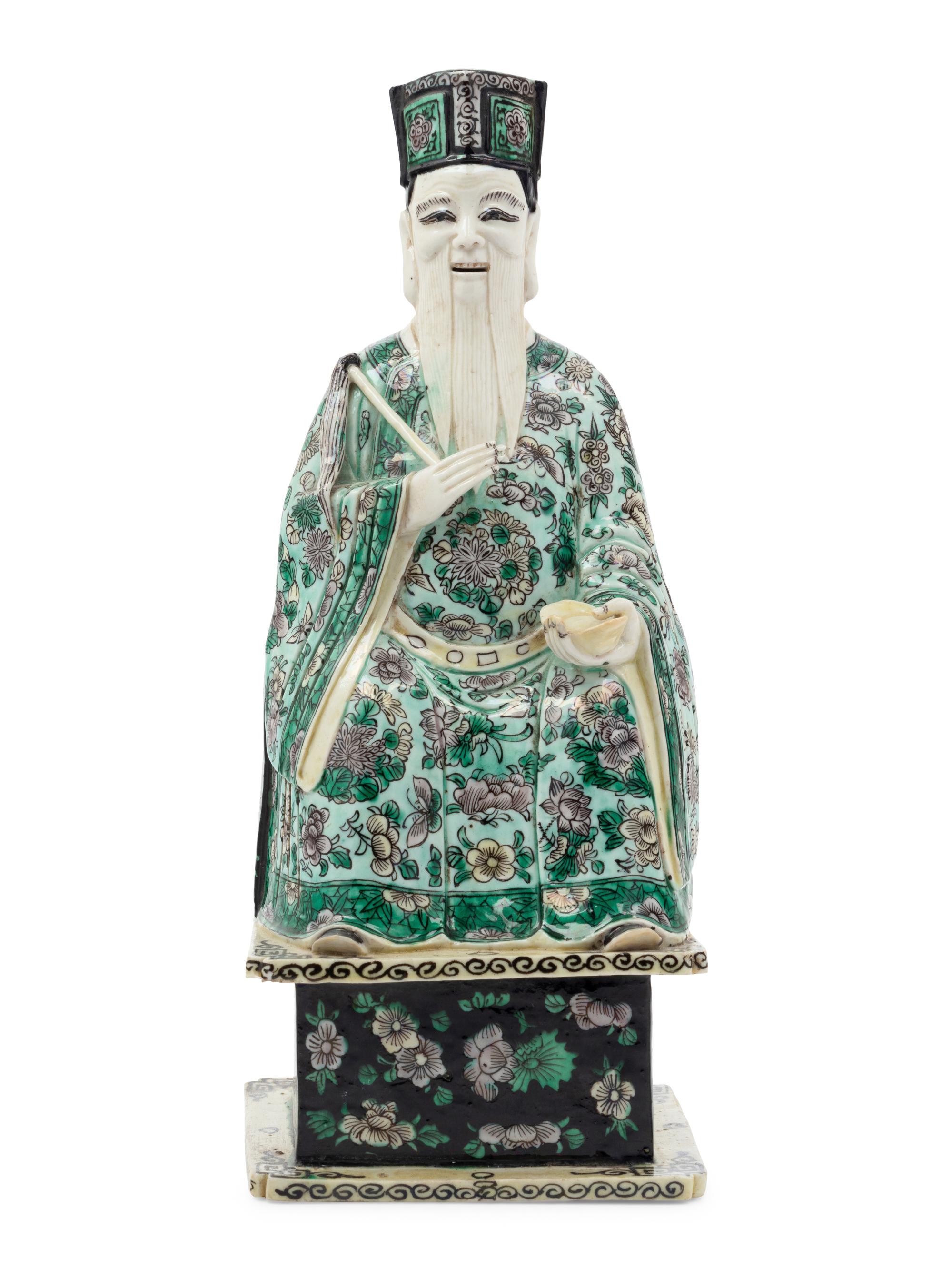 A Chinese Famille Verte Porcelain Figure of an Immortal