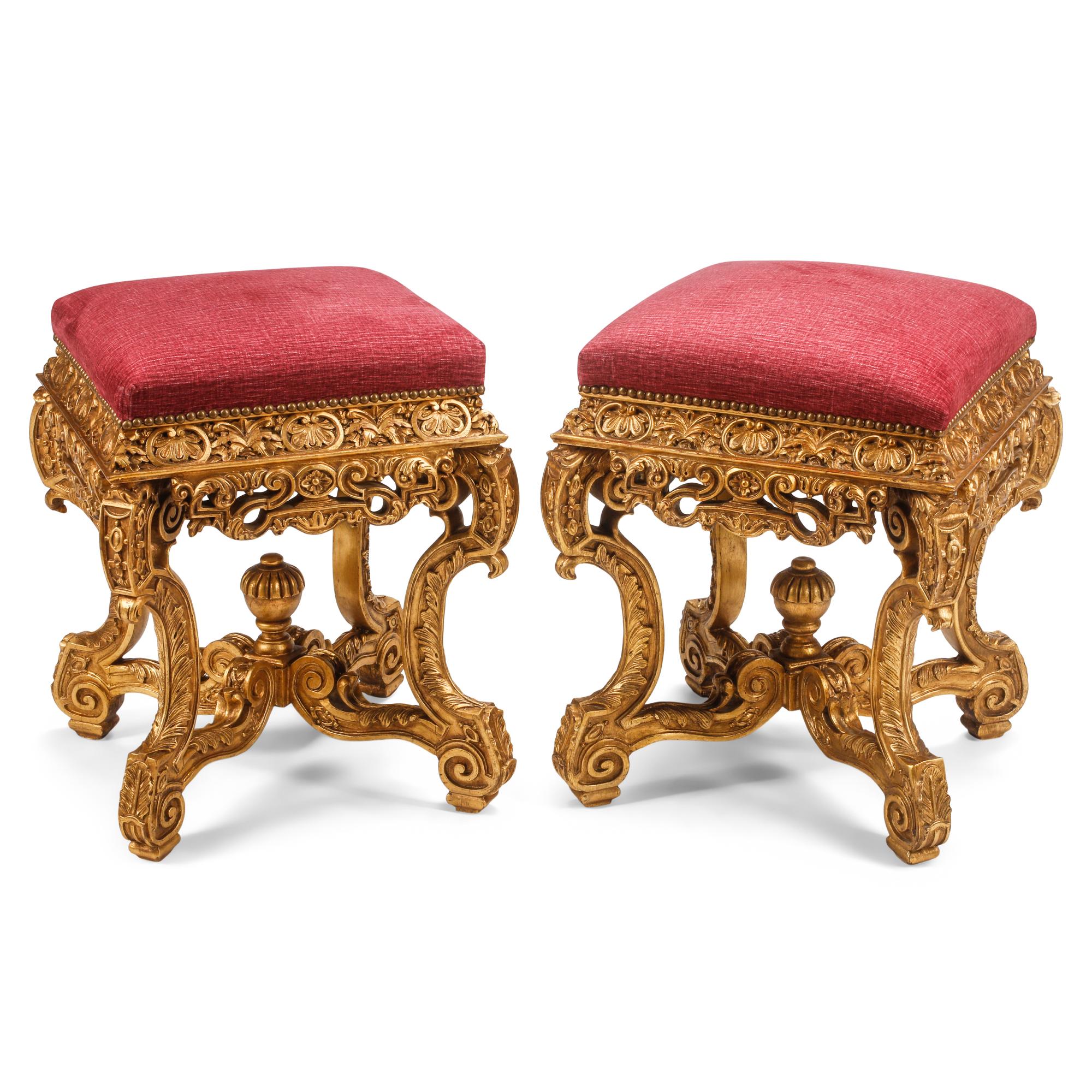 A Pair of Régence Style Carved Giltwood Stools