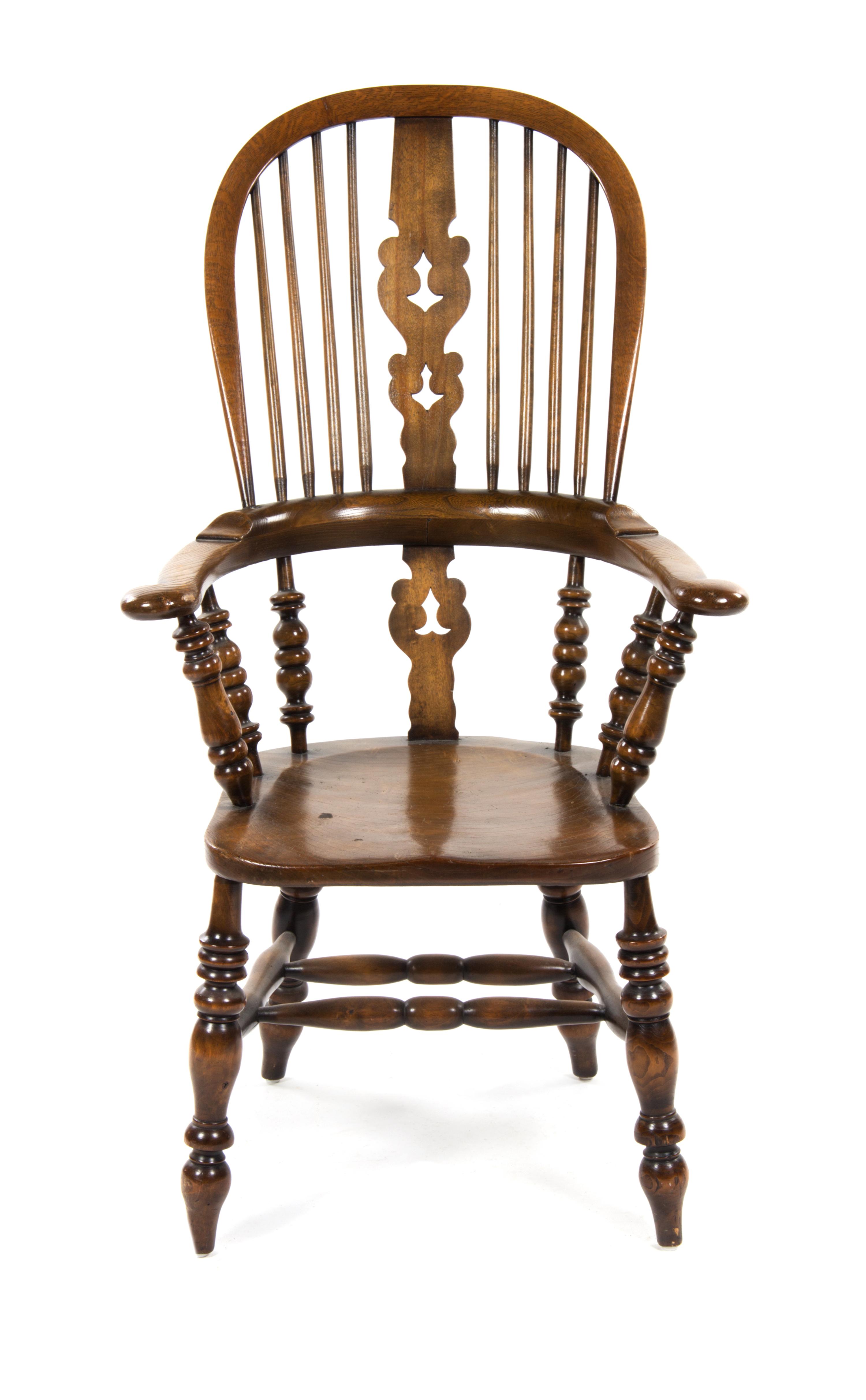 An English Walnut Windsor Chair, Height 45 1/2 inches.
