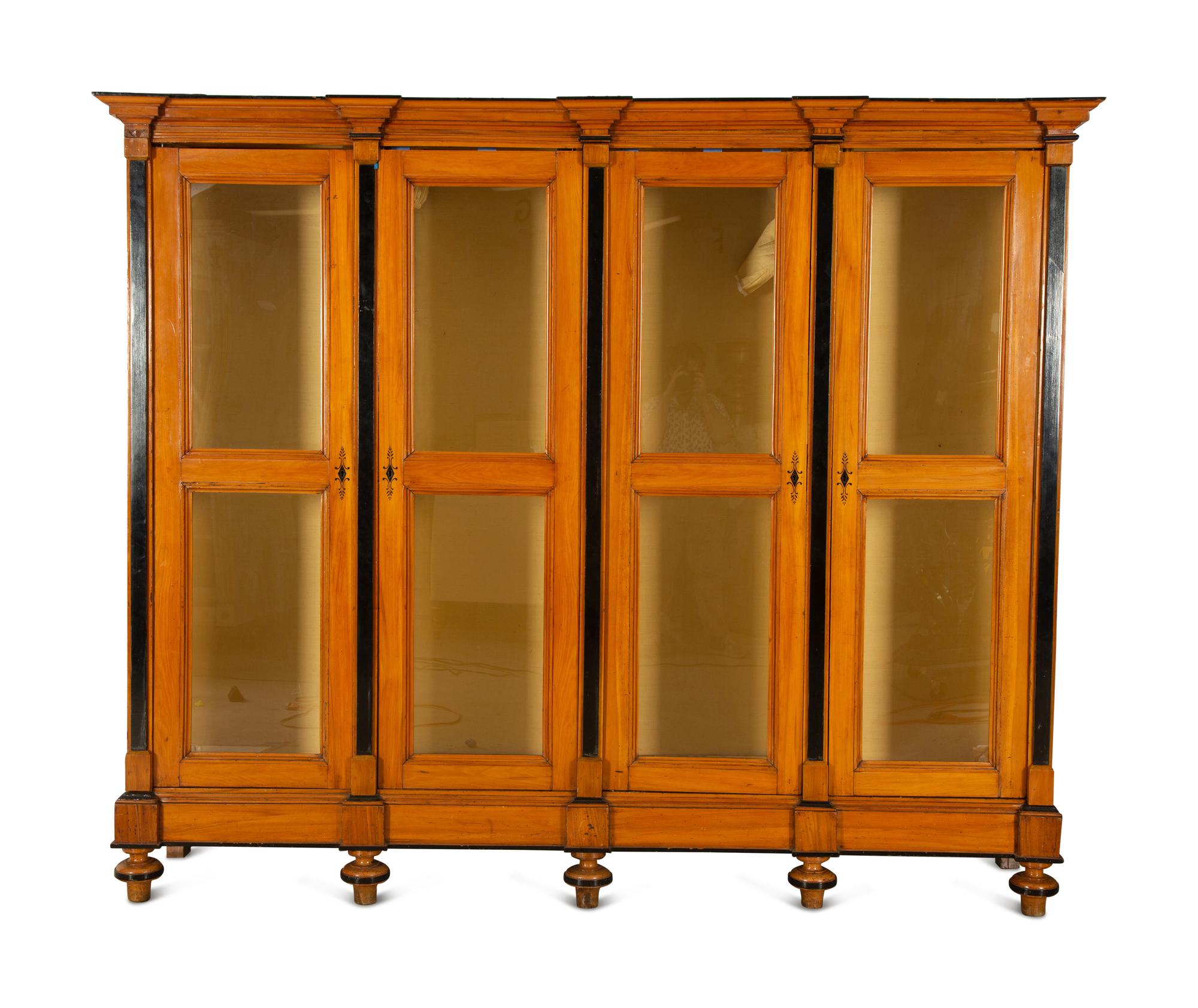 A Biedermeier Style Walnut Bookcase — 19th/20th Century