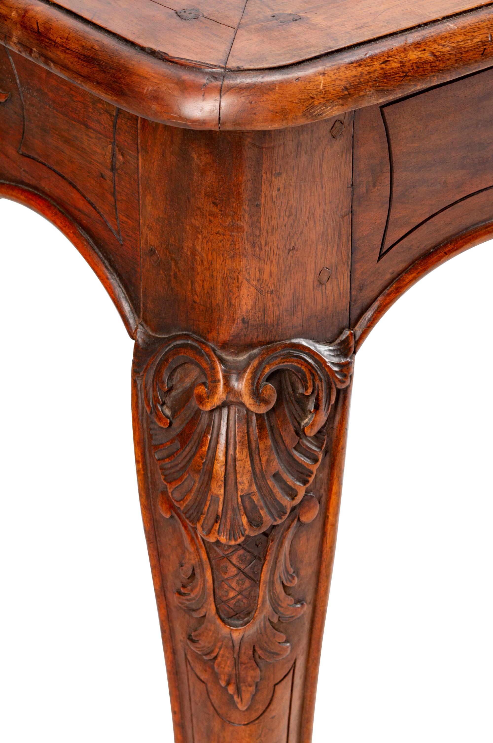 A Louis XV Style Carved Walnut Table — 19TH CENTURY