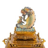 A French "Japonisme" Gilt Bronze and Porcelain Mounted Clock