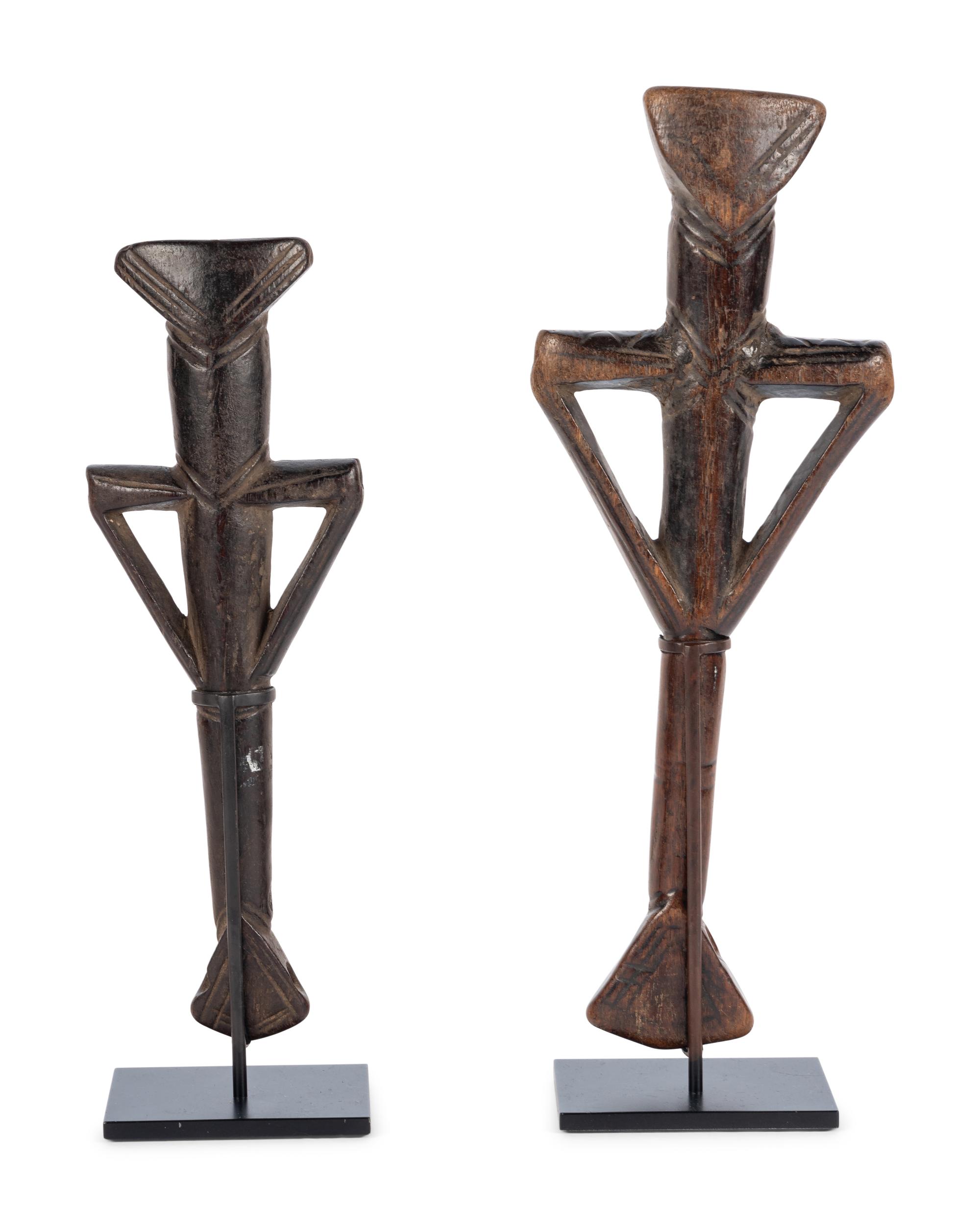A Pair of African Carved Wood Figures