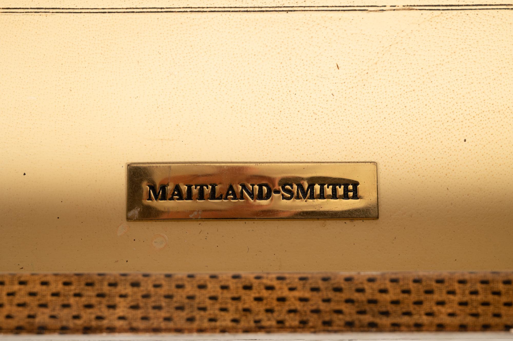 A Regency Style Gilt Metal and Leather Veneered Desk
