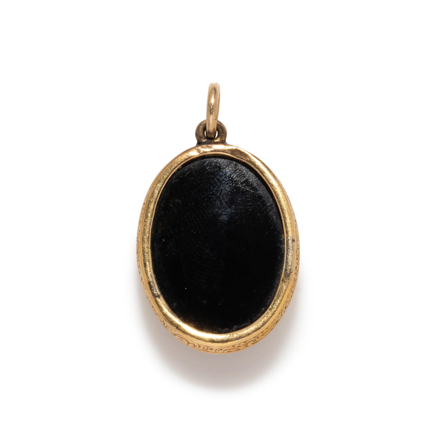 A Neoclassical Gold and Sardonyx Cameo Brooch with the God Jupiter
