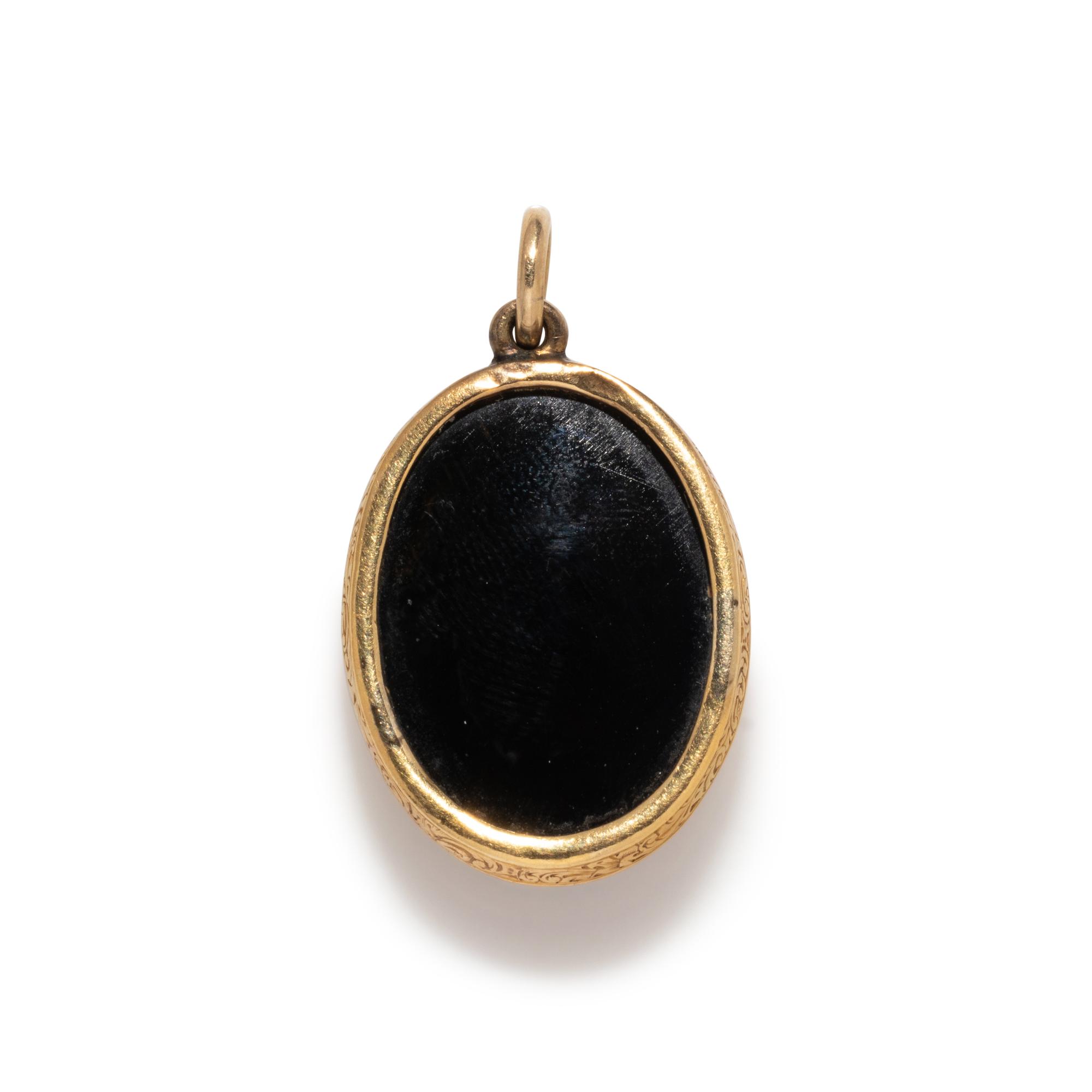 A Neoclassical Gold and Sardonyx Cameo Brooch with the God Jupiter