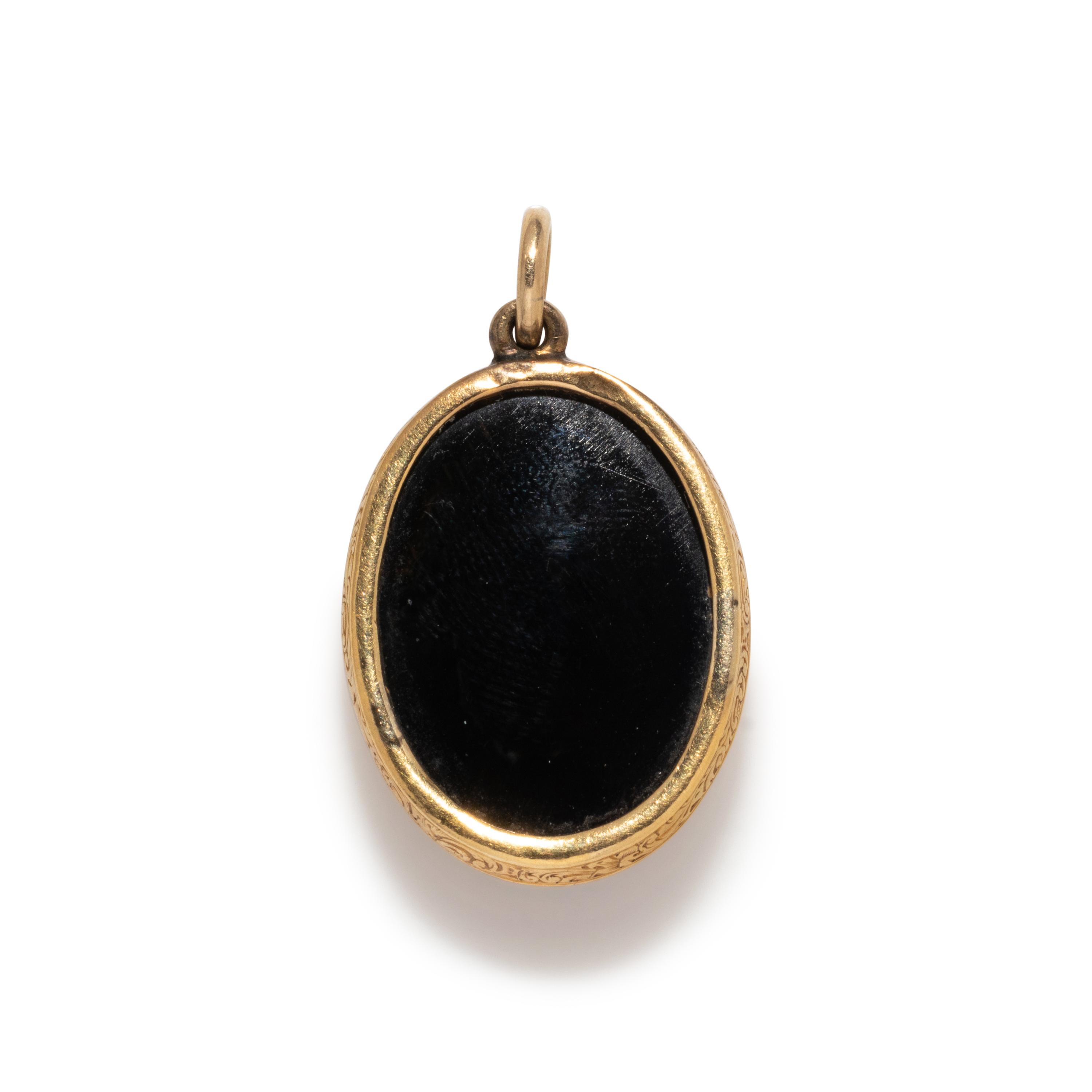 A Neoclassical Gold and Sardonyx Cameo Brooch with the God Jupiter