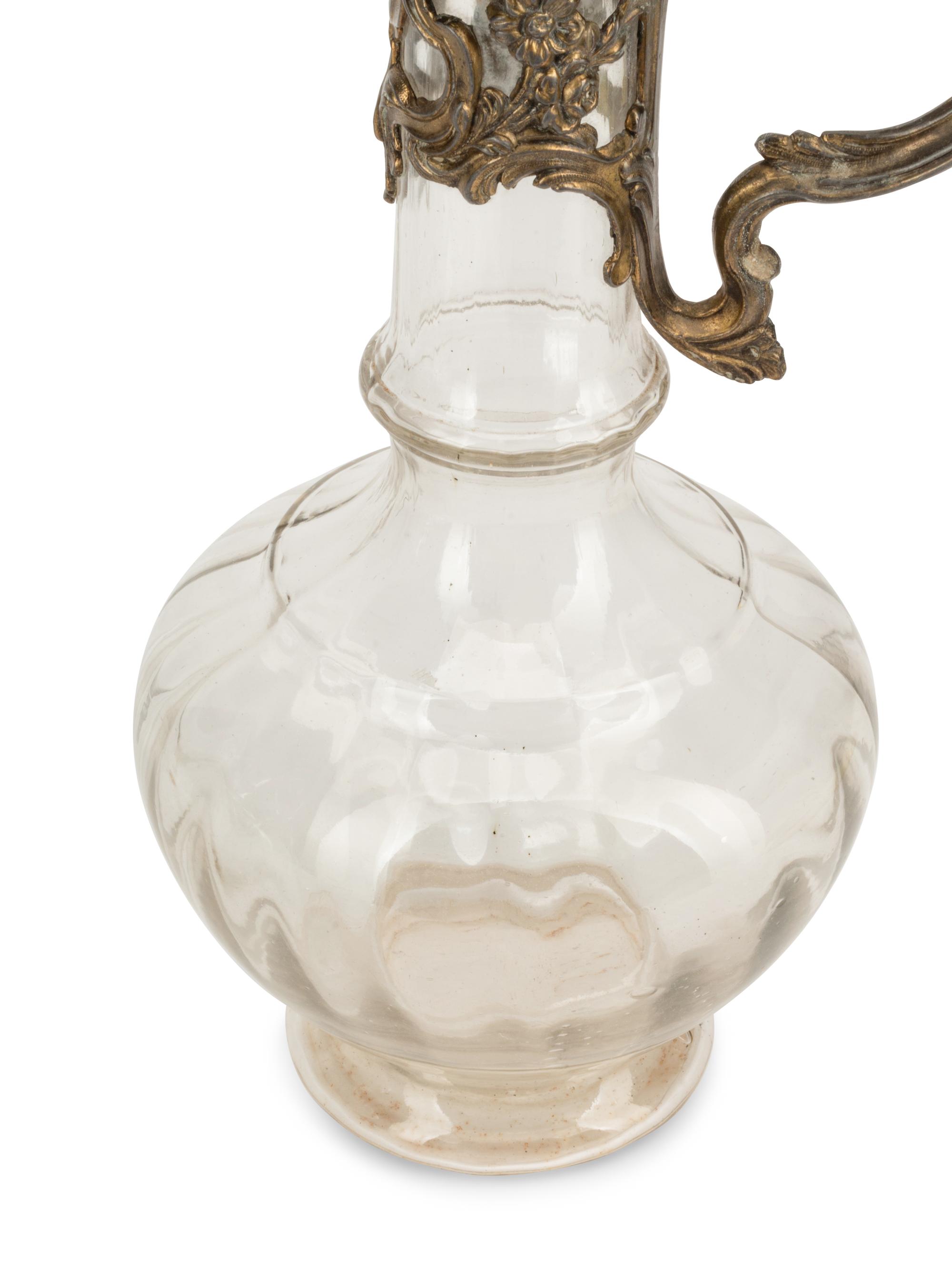Two Continental Pewter Mounted Glass Claret Jugs