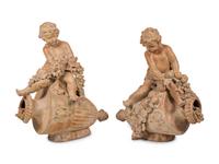 A Pair of Terra Cotta Putti Ornaments